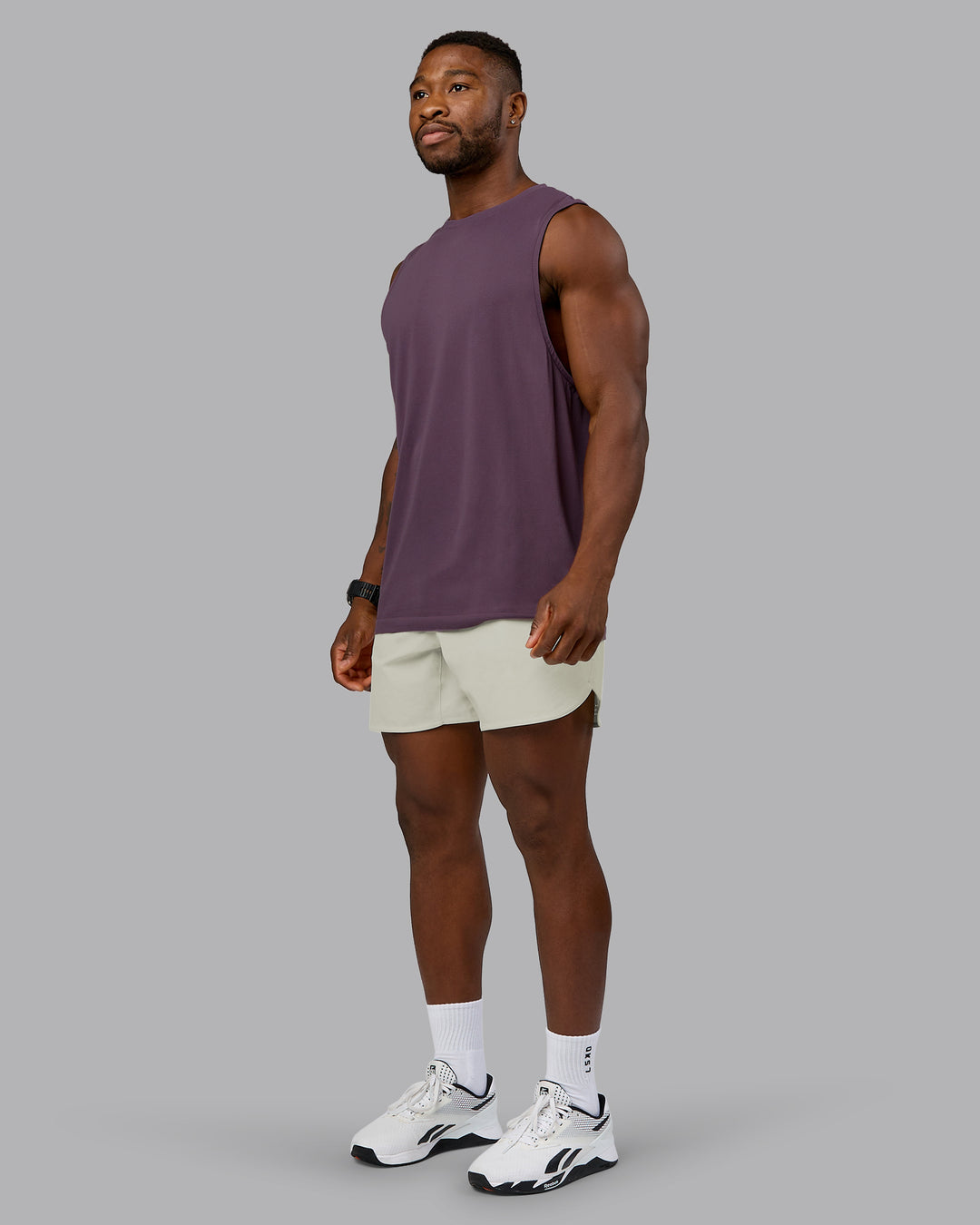 Man wearing Lift 6&quot; Performance Short - Bone | Model:Sam | Size:L