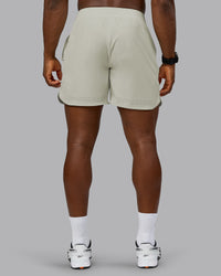 Man wearing Lift 6" Performance Short - Bone | Model:Sam | Size:L