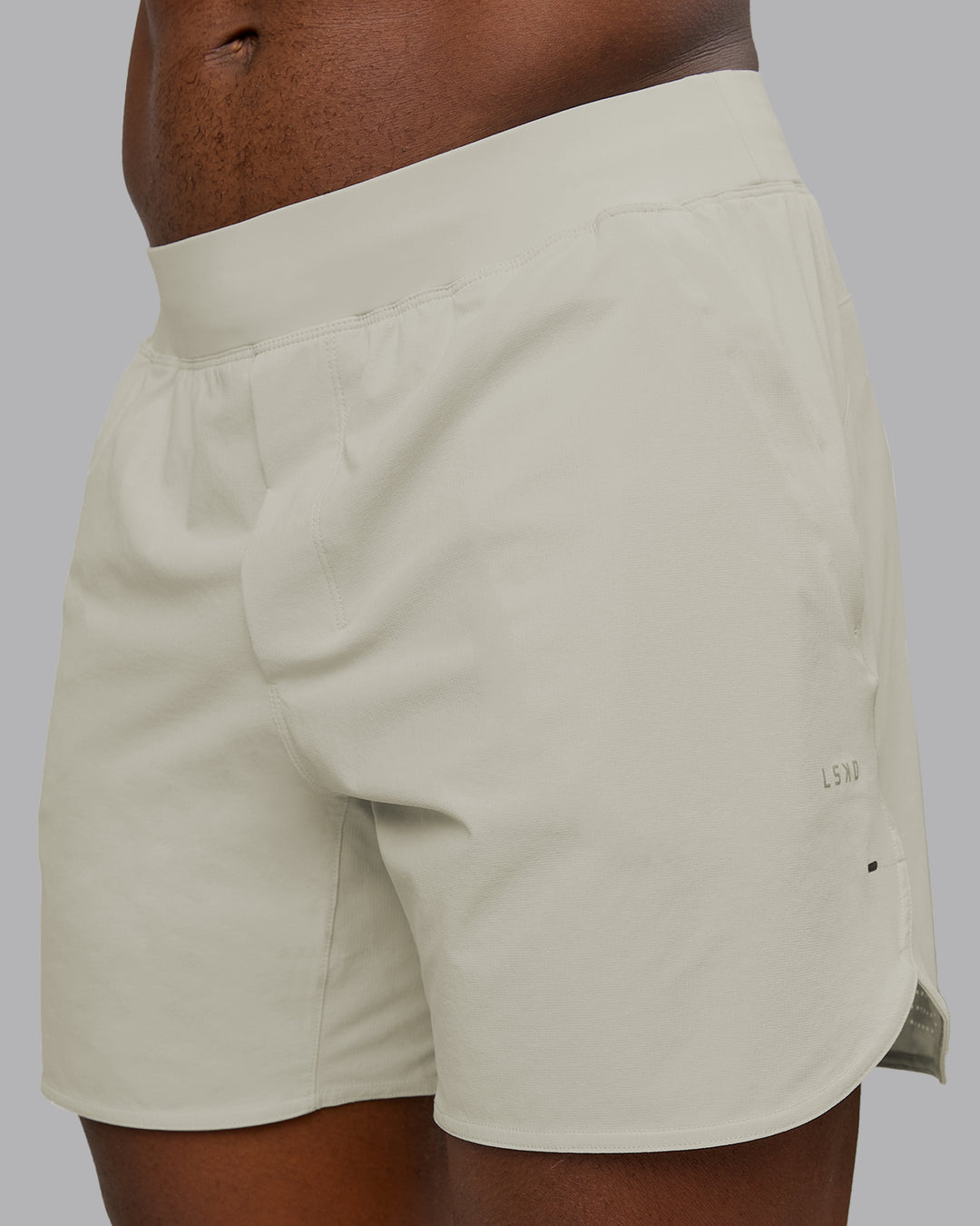 Man wearing Lift 6&quot; Performance Short - Bone | Model:Sam | Size:L