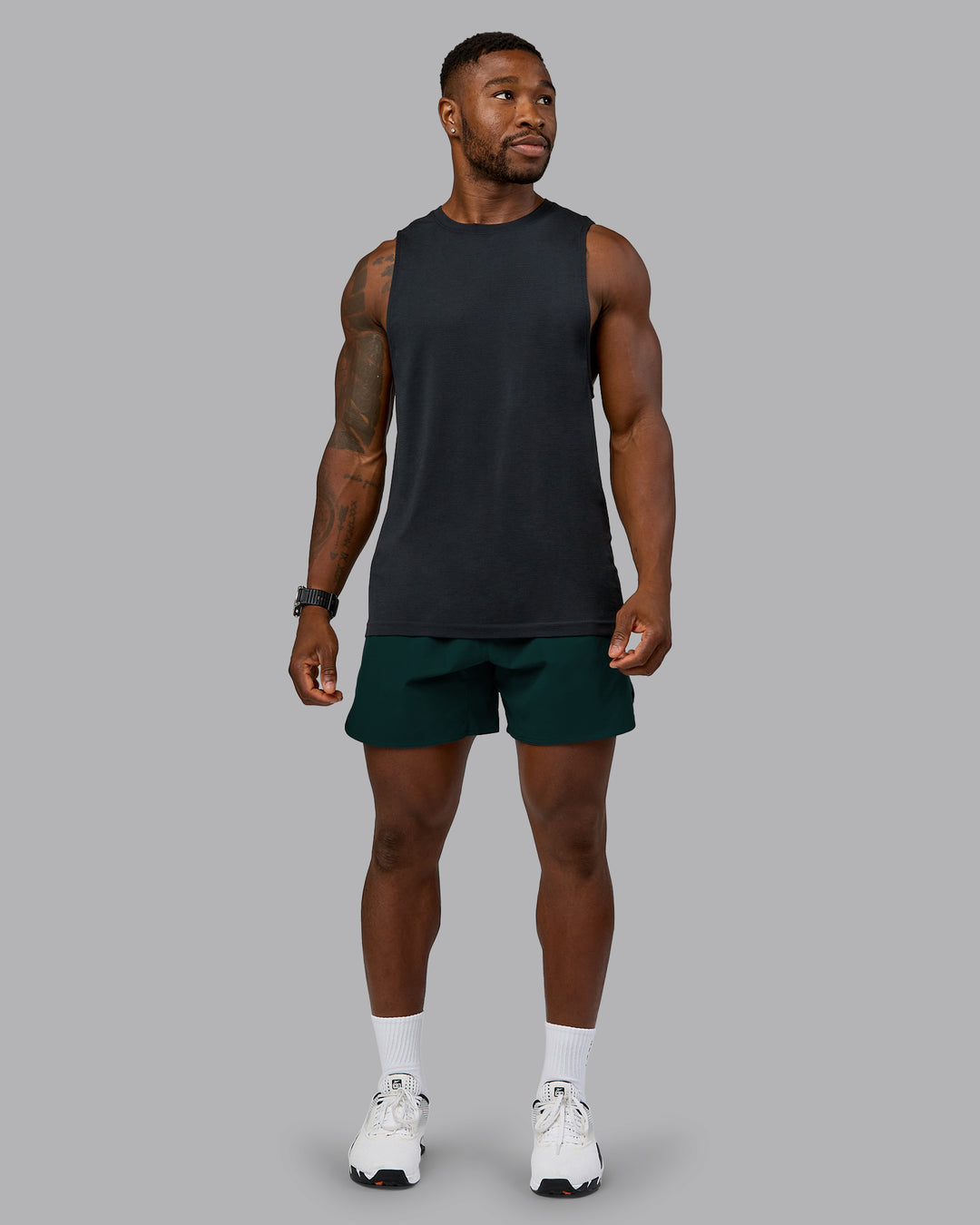 Man wearing Lift 6&quot; Performance Short - Dark Moss | Model:Sam | Size:L