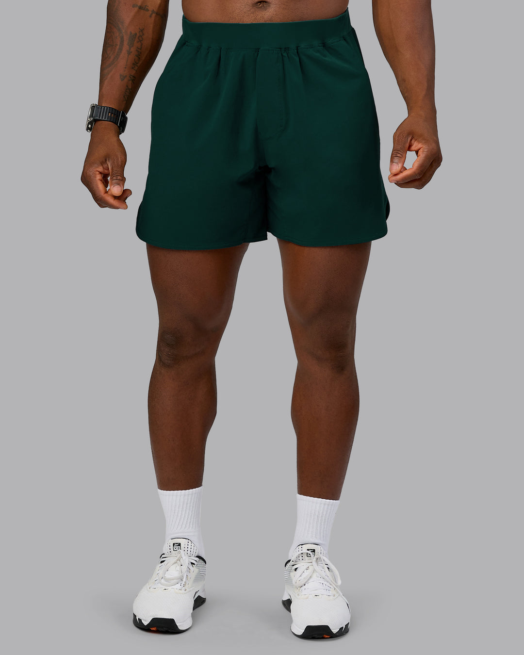 Man wearing Lift 6&quot; Performance Short - Dark Moss | Model:Sam | Size:L