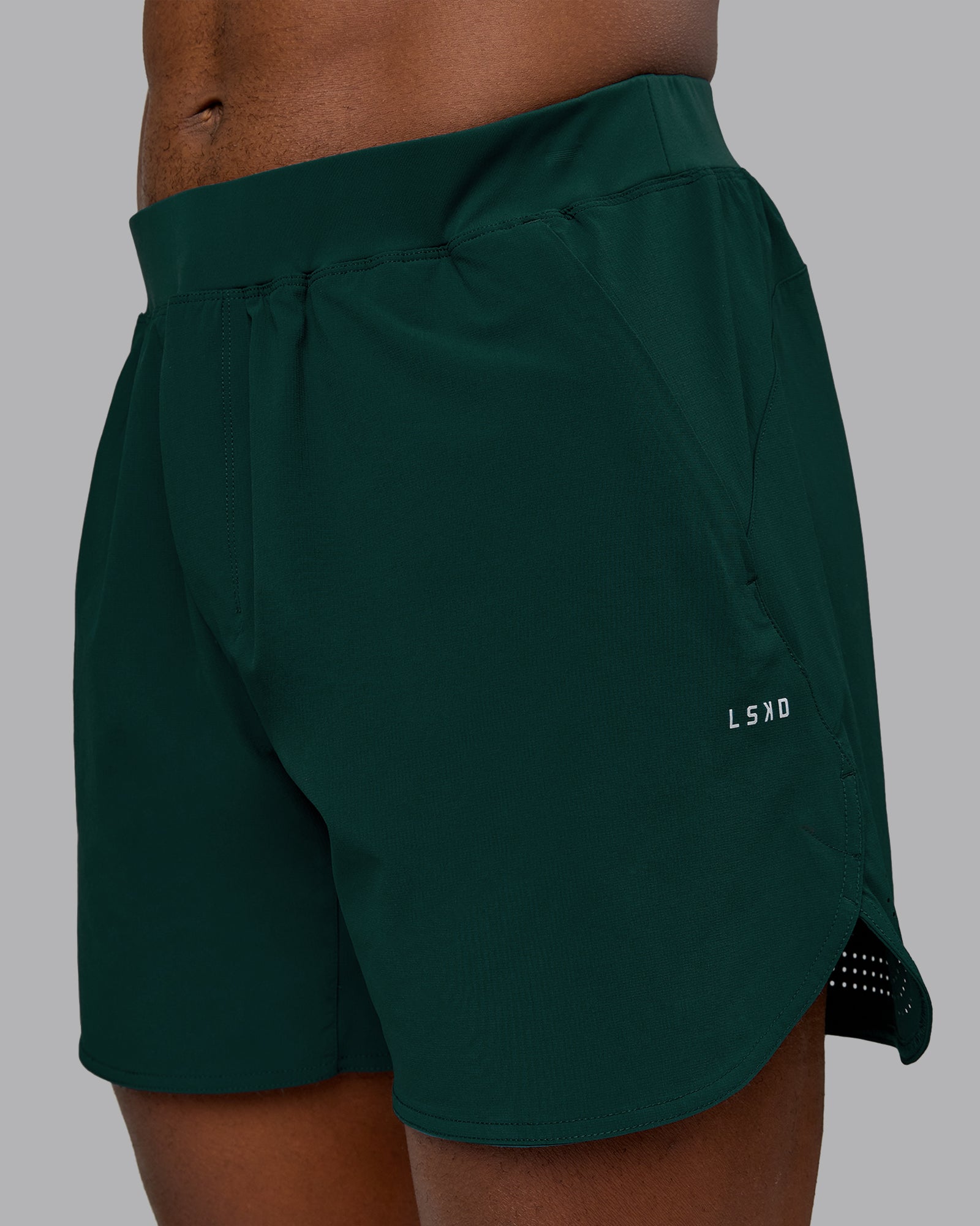 Man wearing Lift 6" Performance Short - Dark Moss | Model:Sam | Size:L