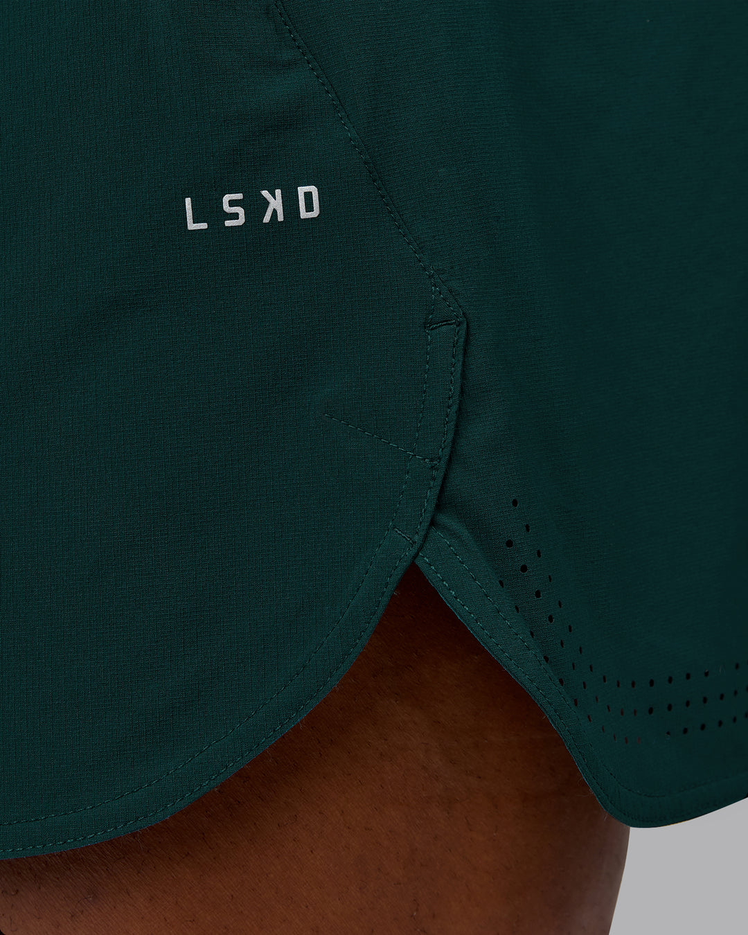 Man wearing Lift 6&quot; Performance Short - Dark Moss | Model:Sam | Size:L