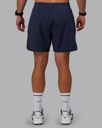 Man wearing Lift 6" Performance Shorts - Future Navy