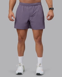 Man wearing Lift 6" Performance Shorts - Purple Sage