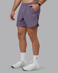 Man wearing Lift 6" Performance Shorts - Purple Sage