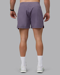 Man wearing Lift 6" Performance Shorts - Purple Sage