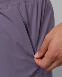 Man wearing Lift 6" Performance Shorts - Purple Sage
