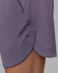 Man wearing Lift 6" Performance Shorts - Purple Sage