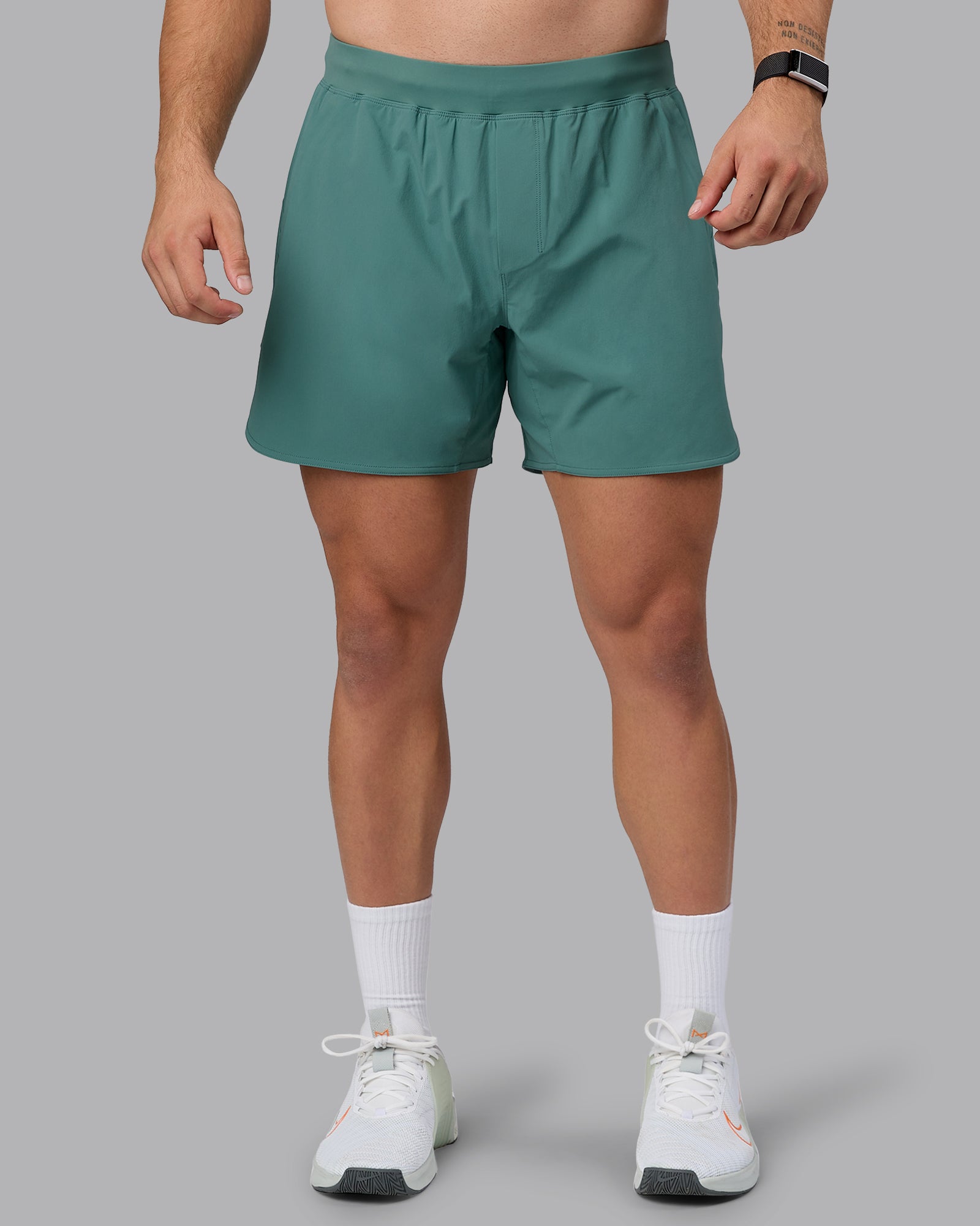 Man wearing Lift 6" Performance Shorts - Sagebrush