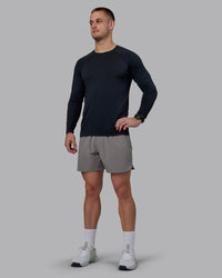 Man wearing Lift 6" Performance Shorts - Storm Front