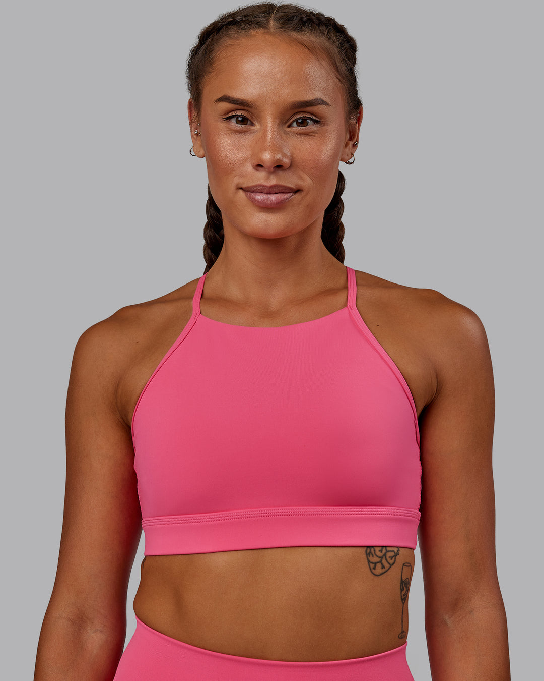 Woman wearing Lift High Neck Sports Bra - Hot Pink