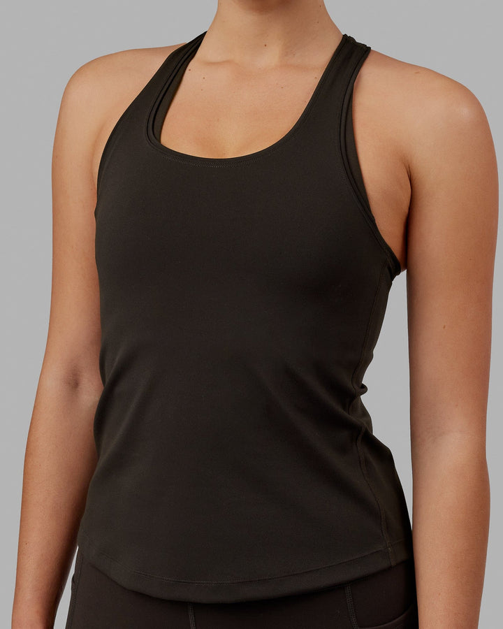 Woman wearing Lift Racerback Active Tank - Dark Walnut