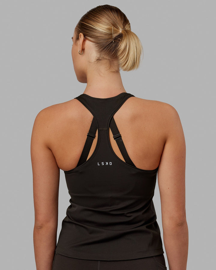 Woman wearing Lift Racerback Active Tank - Dark Walnut