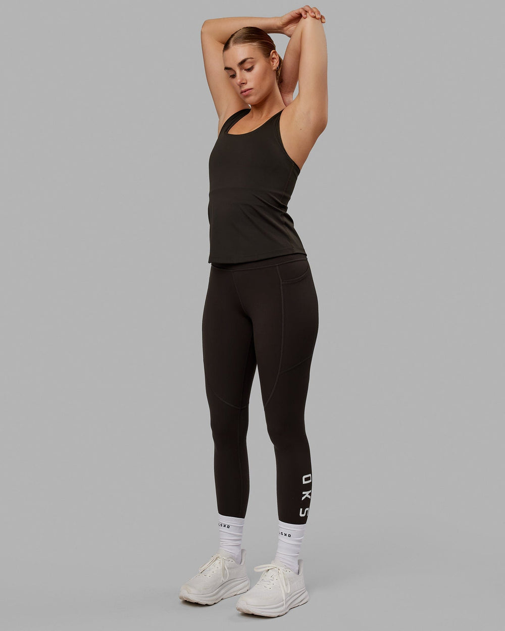 Woman wearing Lift Racerback Active Tank - Dark Walnut