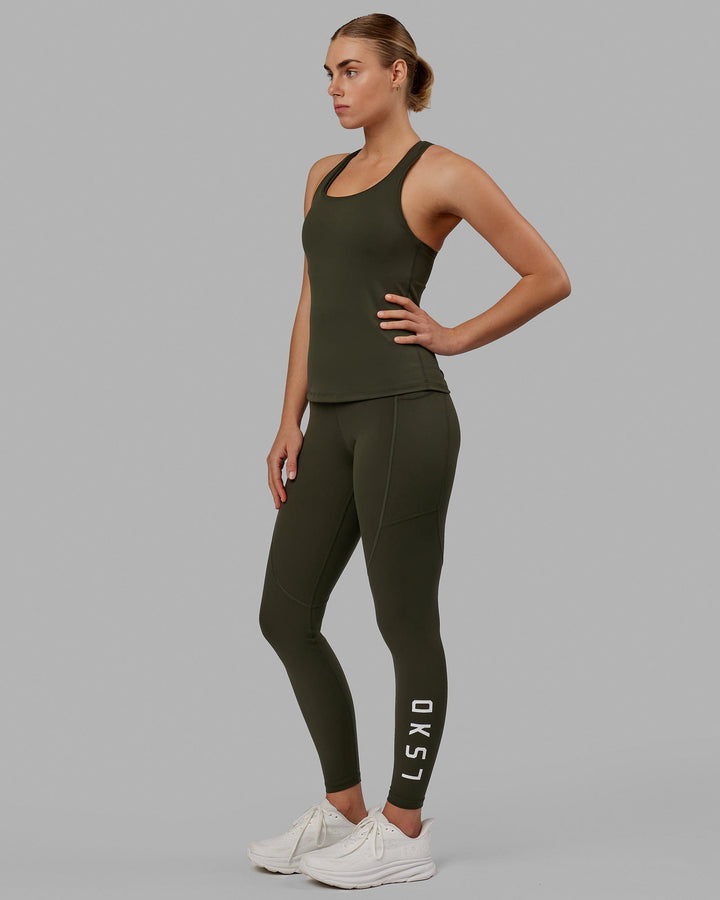Woman wearing Lift Performance Tank - Forest Night