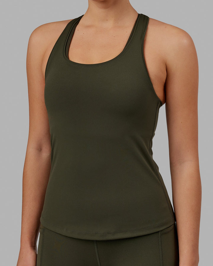 Woman wearing Lift Performance Tank - Forest Night