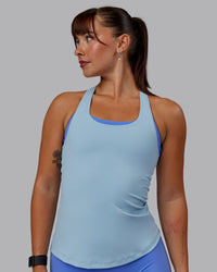 Woman wearing Lift Performance Tank - Glacial Blue