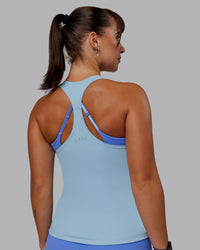 Woman wearing Lift Performance Tank - Glacial Blue