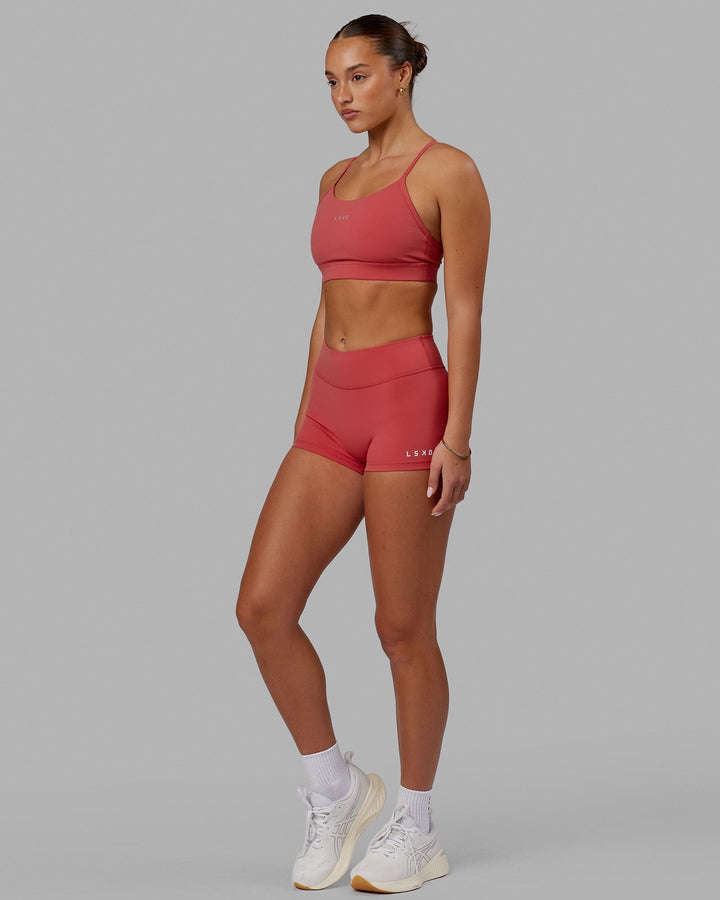 Woman wearing Lift Sports Bra - Mineral Red