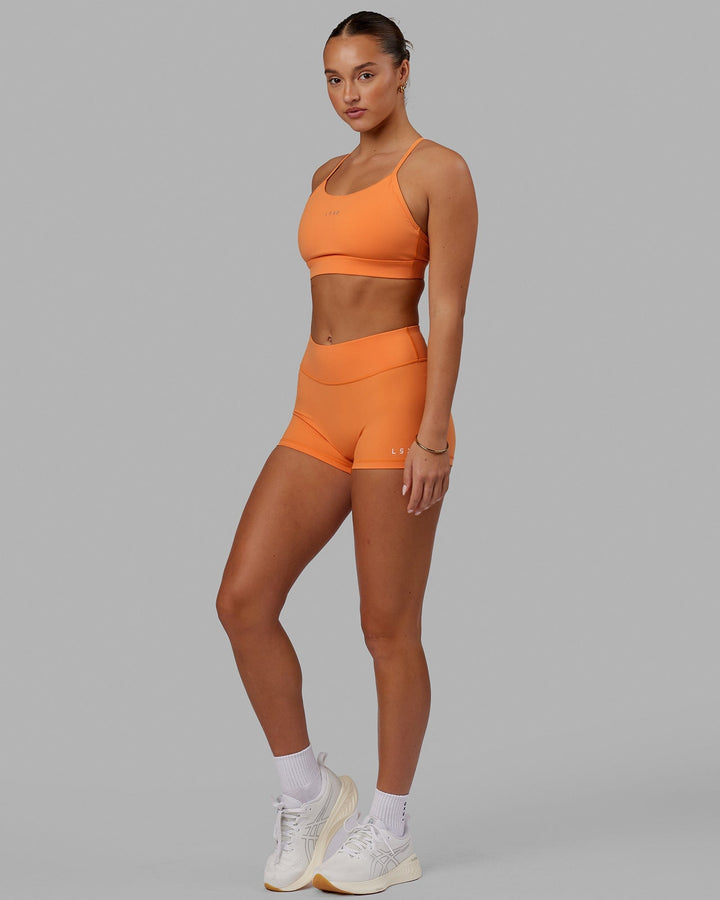 Woman wearing Lift Sports Bra - Tangerine