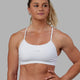 Woman wearing Lift Sports Bra - White