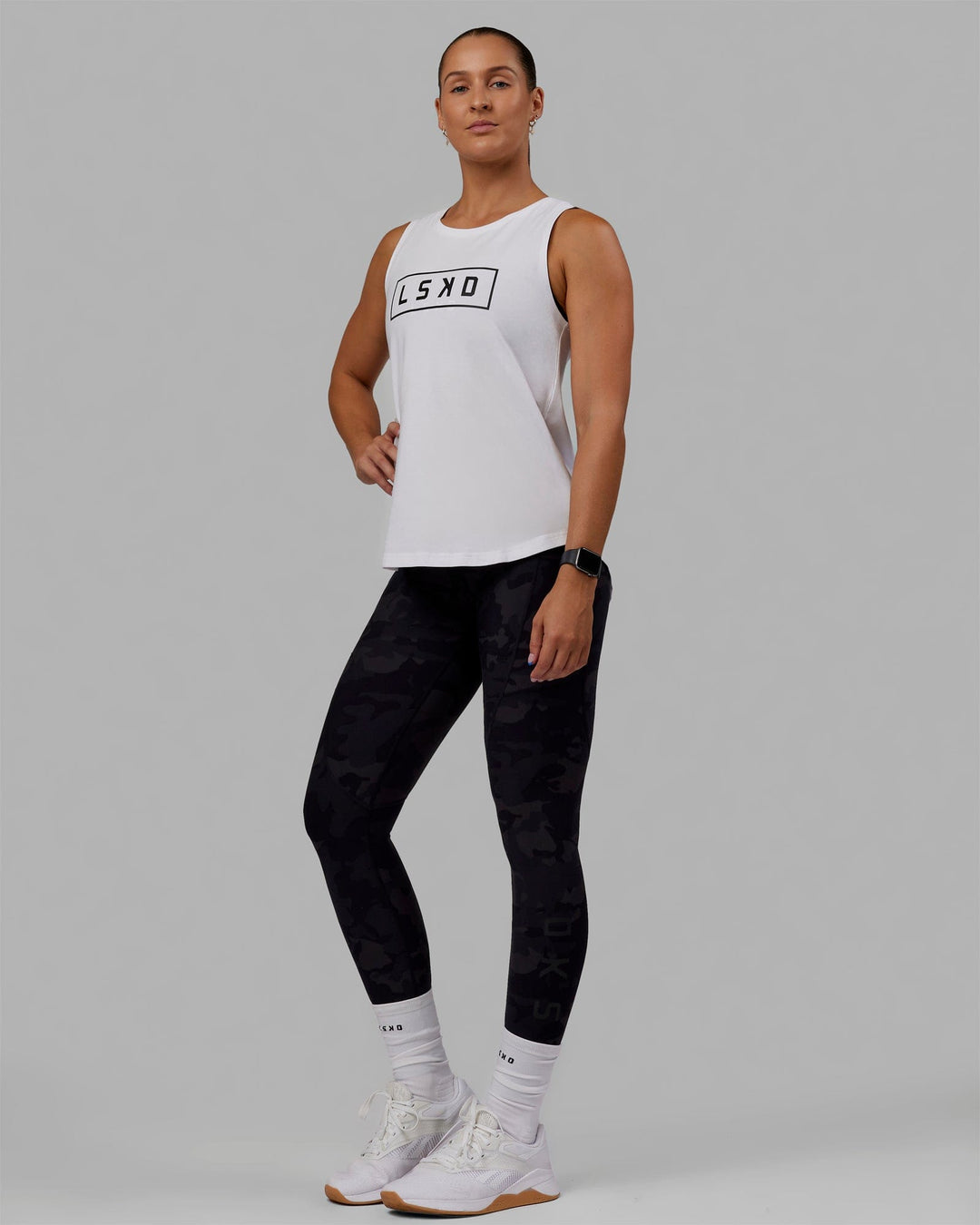 Woman wearing Luna FLXCotton Longline Tank - White-Black