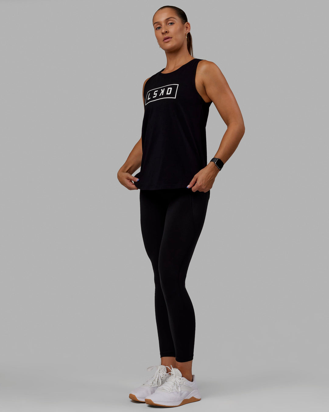 Woman wearing Luna FLXCotton Longline Tank - Black-White