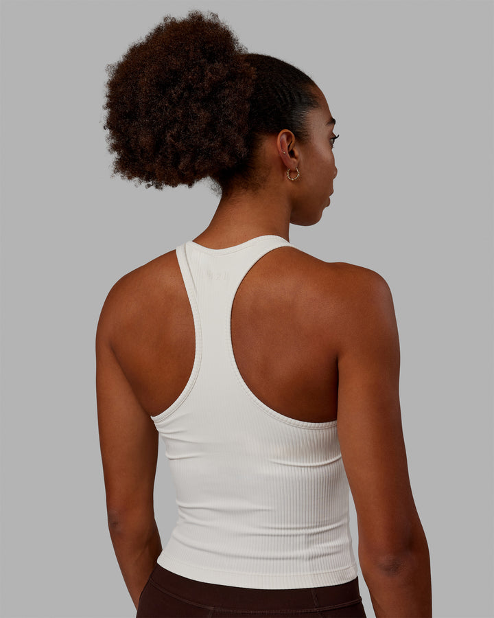 Woman wearing Luxe Ribbed Flow Shelf Bra Performance Tank - Off White