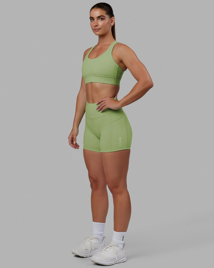 Woman wearing MVP 2.0 Sports Bra - Green Fig