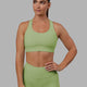 Woman wearing MVP 2.0 Sports Bra - Green Fig