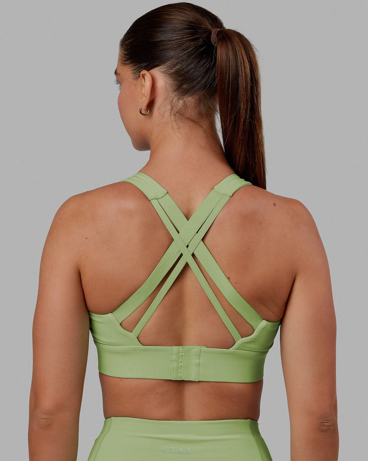 Woman wearing MVP 2.0 Sports Bra - Green Fig