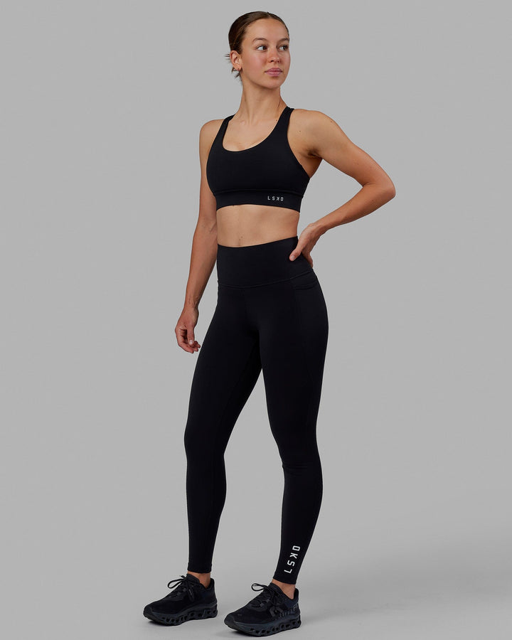 Woman wearing MVP 2.0 Sports Bra - Black