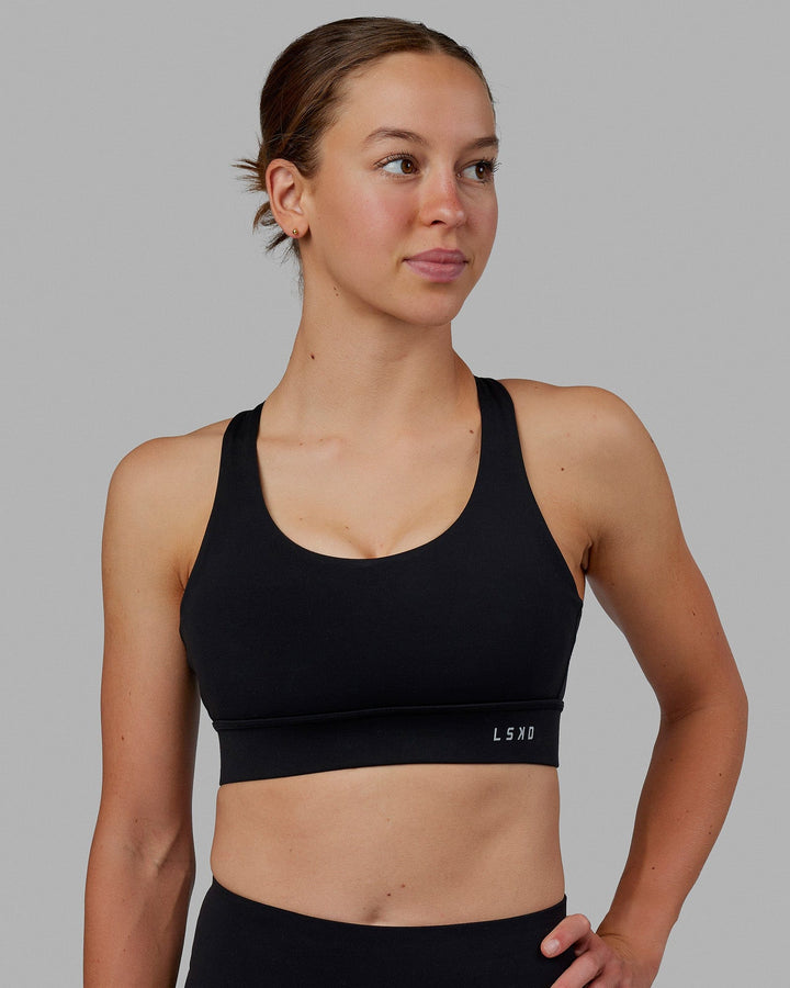 Woman wearing MVP 2.0 Sports Bra - Black