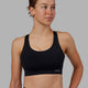 Woman wearing MVP 2.0 Sports Bra - Black