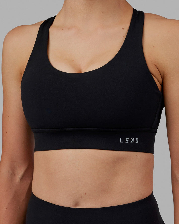 Woman wearing MVP 2.0 Sports Bra - Black