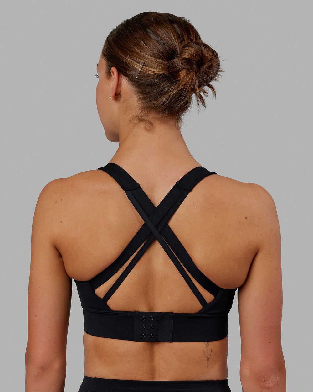 Woman wearing MVP 2.0 Sports Bra - Black