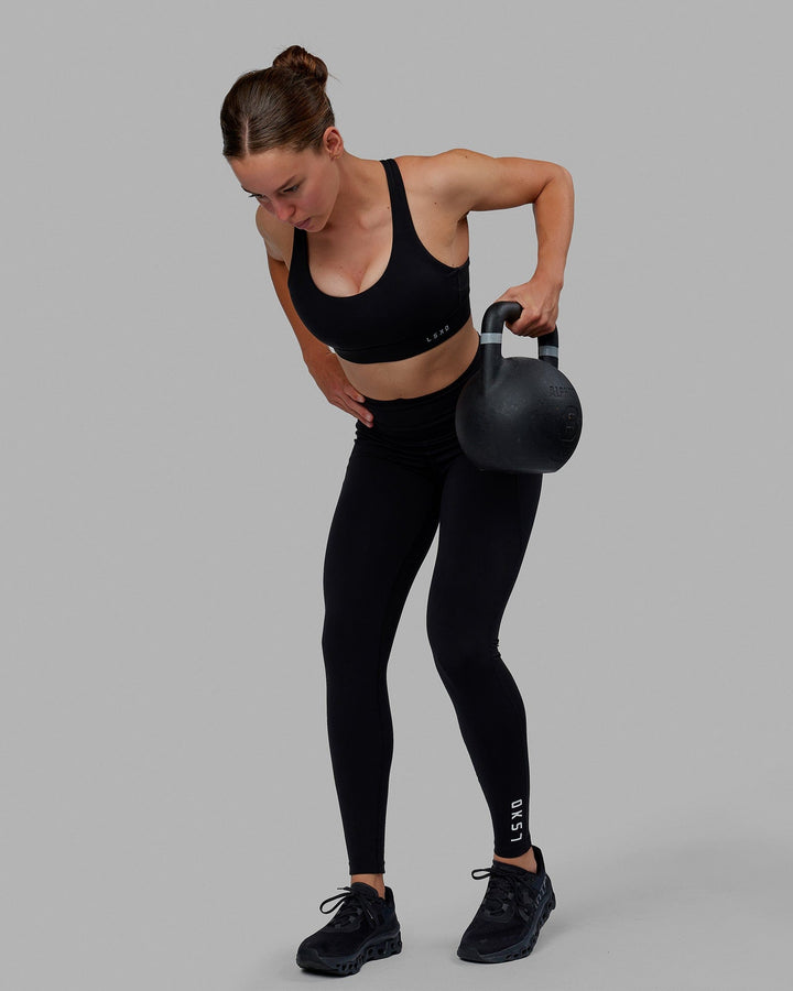 Woman wearing MVP 2.0 Sports Bra - Black