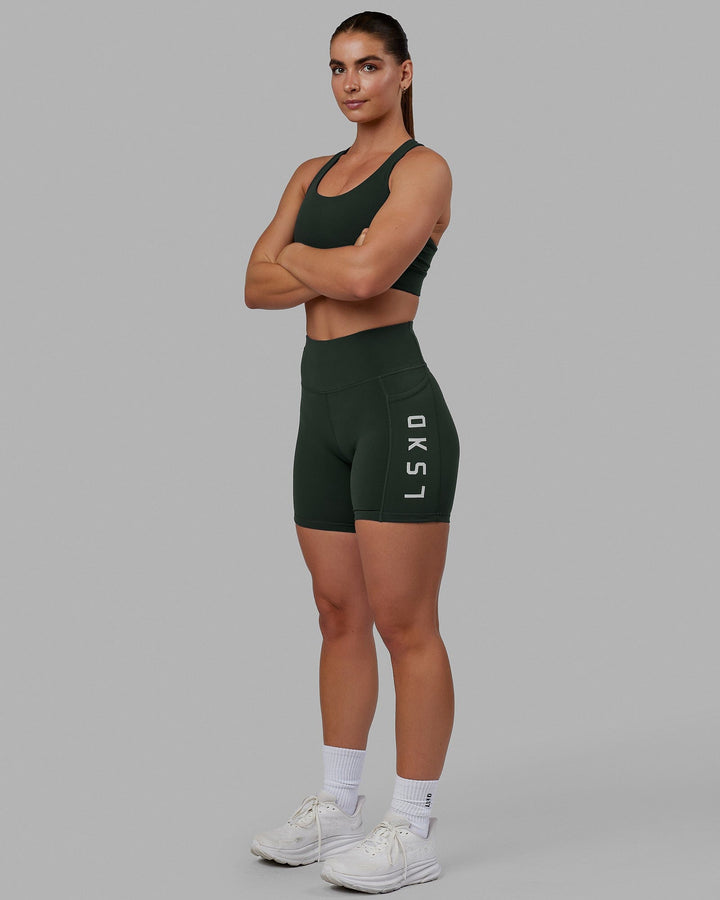Woman wearing MVP 2.0 Sports Bra - Vital Green