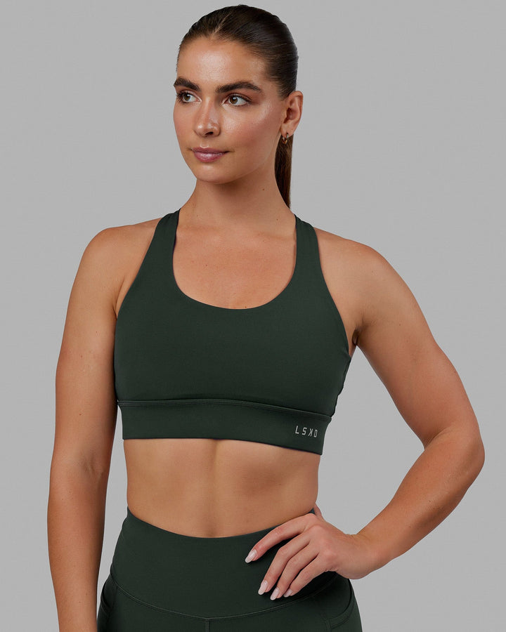 Woman wearing MVP 2.0 Sports Bra - Vital Green