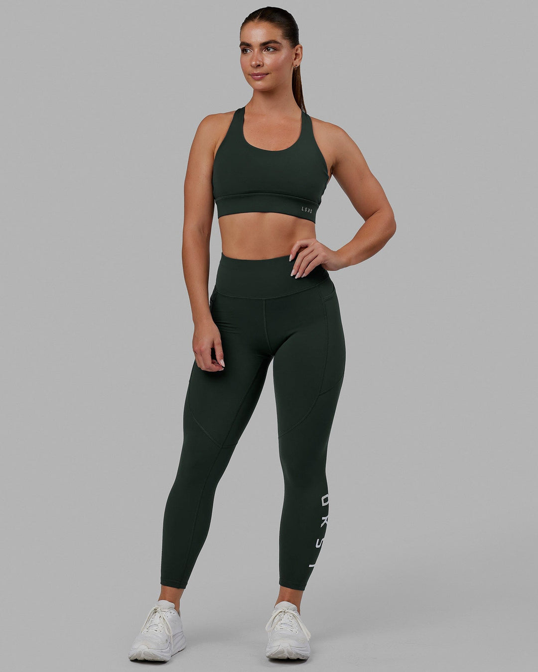 Woman wearing MVP 2.0 Sports Bra - Vital Green