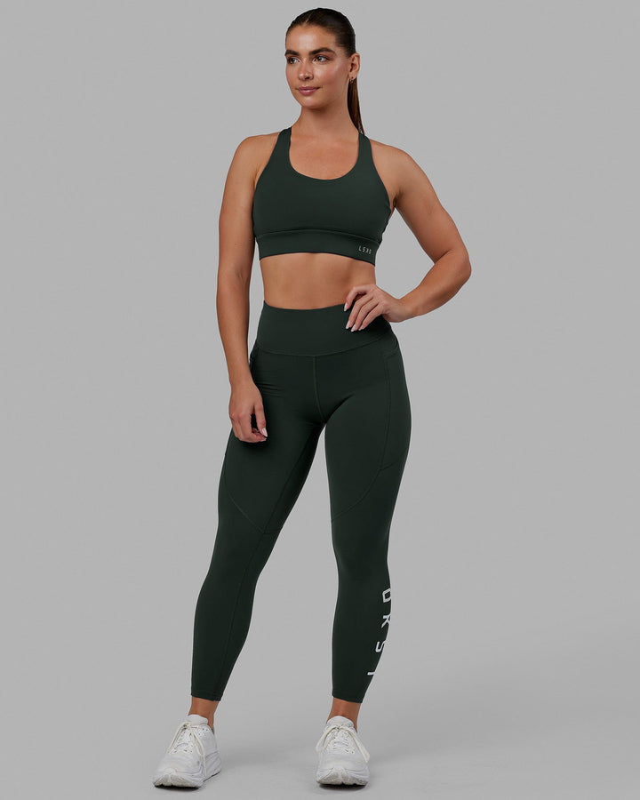 Woman wearing MVP 2.0 Sports Bra - Vital Green