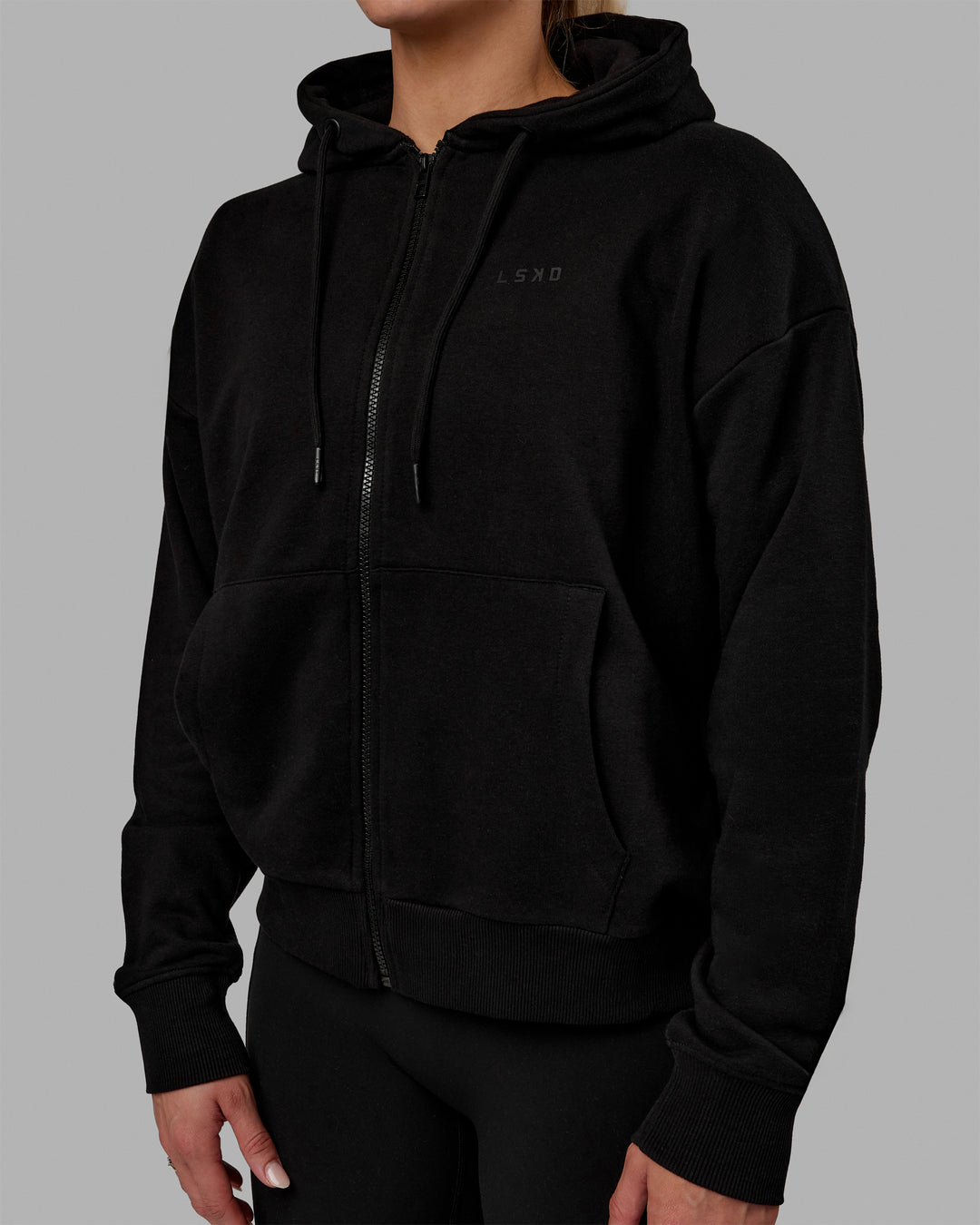 Woman wearing MVP Zip Through Hoodie - Black