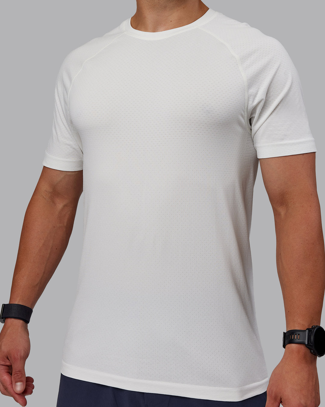 Man wearing AeroFLX+ Seamless Tee - Off White/Off White Marl