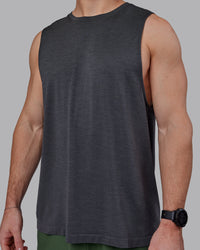 Man wearing AeroFLX+ Seamless Muscle Tank - Pirate Black Marl