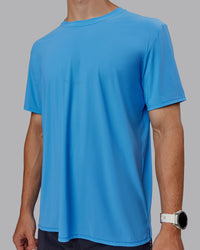 Man wearing Cadence Tee - Azure Blue