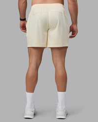 Man wearing Restore 6" CloudFLX Shorts - Ivory