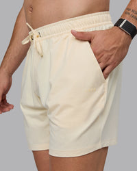 Man wearing Restore 6" CloudFLX Shorts - Ivory