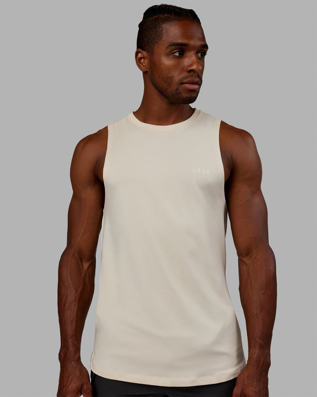 Man wearing Deluxe PimaFLX Tank - Chalk