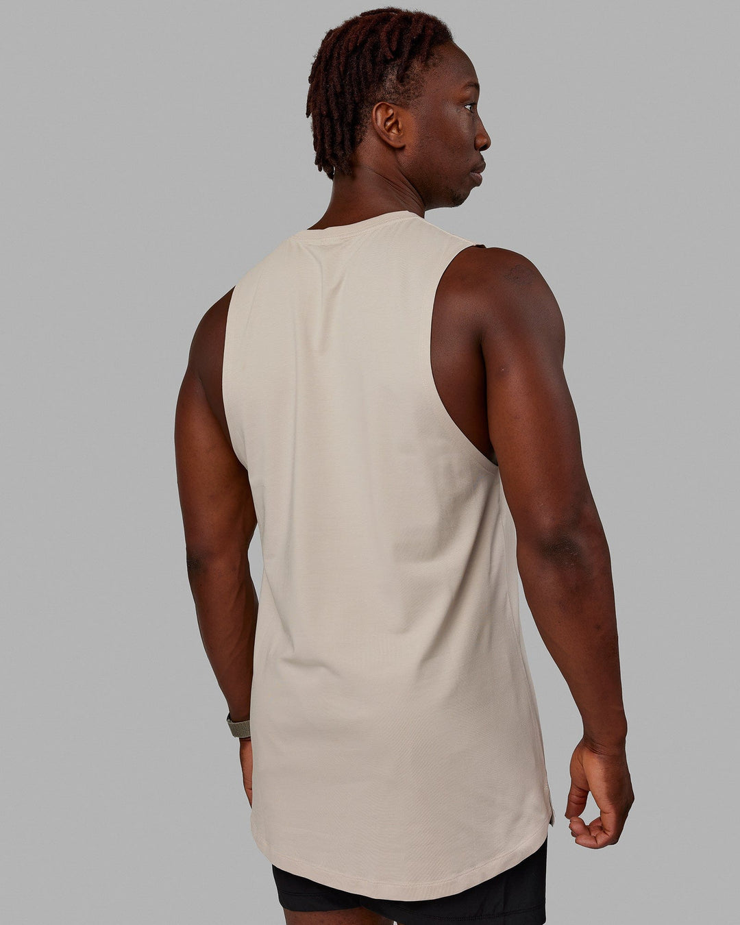 Man wearing Deluxe PimaFLX Tank - Shale Beige